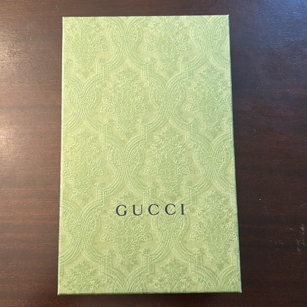 GUCCI box with GUCCI ribbon! No tears, dents or imperfections.
